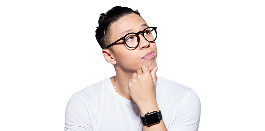 man in glasses looking off to the right with his fist under in chin